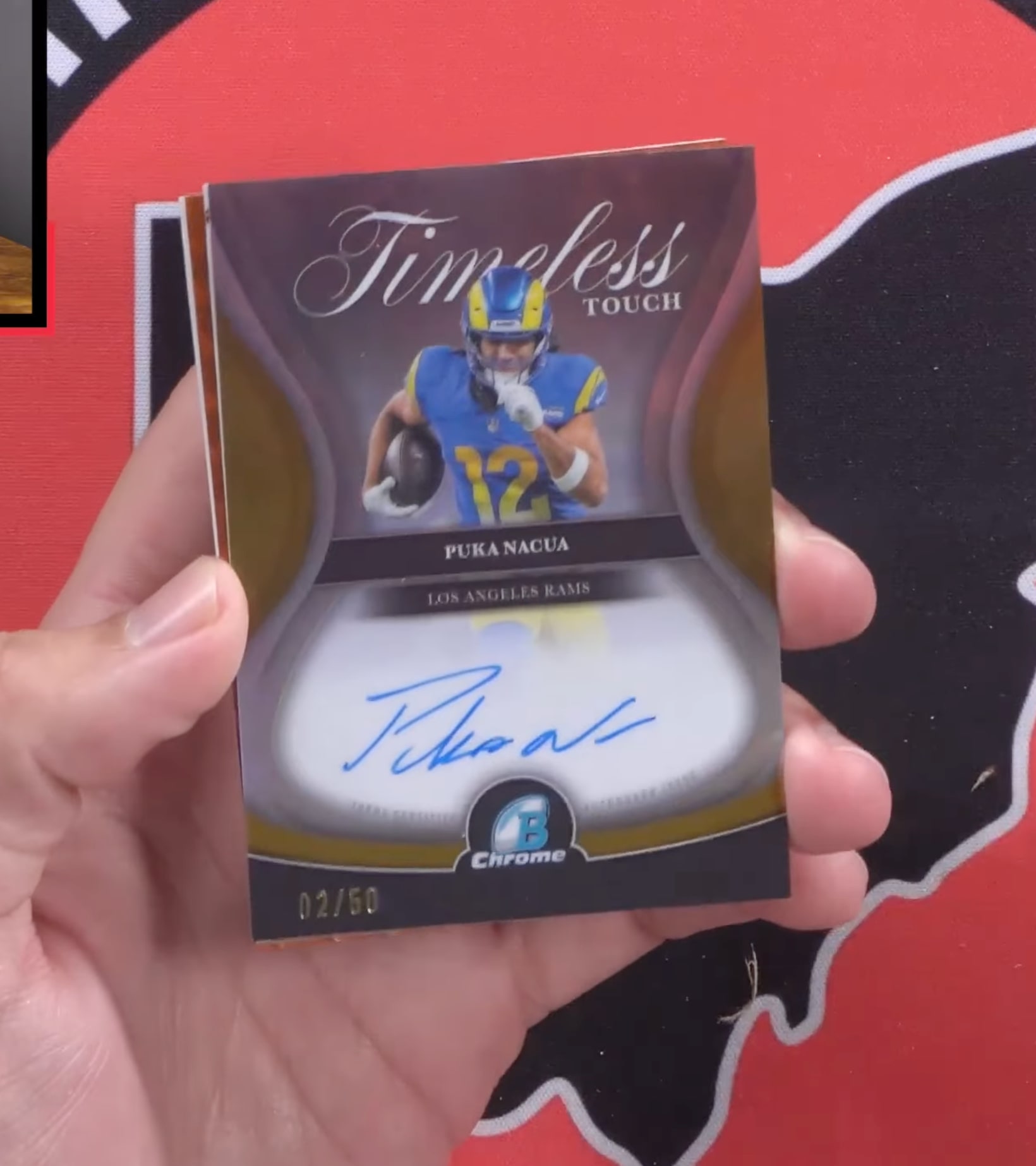 Puka Nacua Gold Refractor serial 2 of 50