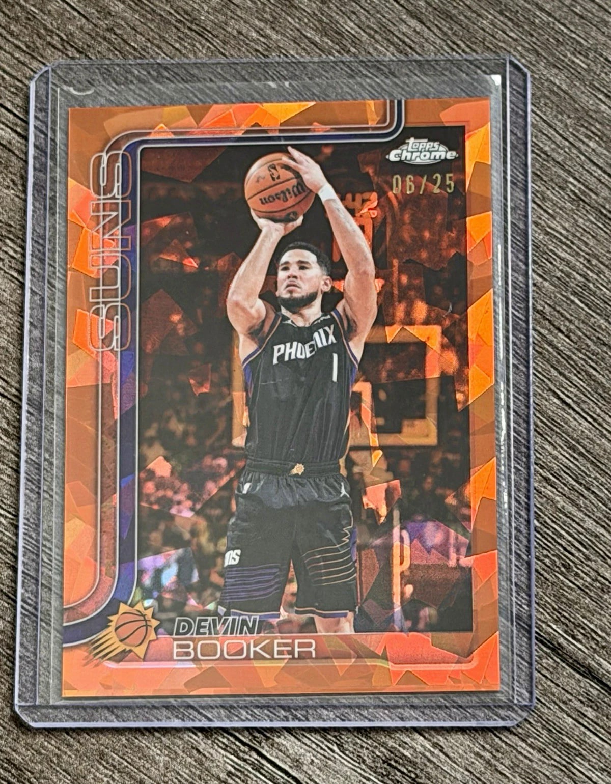Devin Booker Orange Sapphire serial 6 of 25